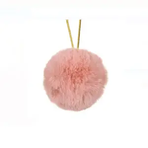 Glob de Craciun cu blana roz/nude - 8 cm