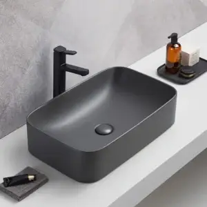 Lavoar ceramic pe blat gri inchis mat Mira 610 mm